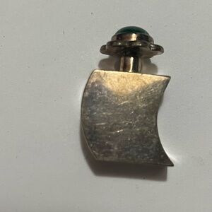 Vintage perfume bottle with green gem top